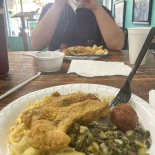 Catfish, cabbage, greens, hush puppies