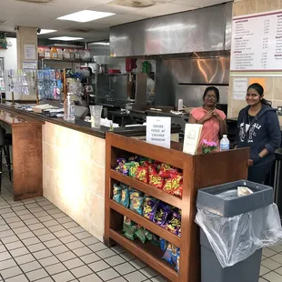 Counter, Menu Board, and Friendly Staff