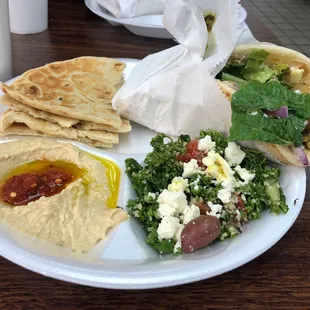 Chicken gyro platter served with tabouli and hummus