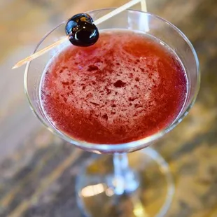 a drink in a martini glass