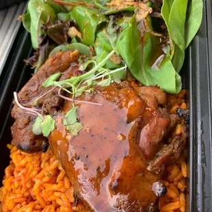 BBQ chicken, red rice, and salad