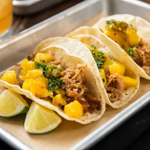 MOJO PORK CARNITAS TACO Citrus Marinade, Grilled Pineapple, Pickled Jalapeno