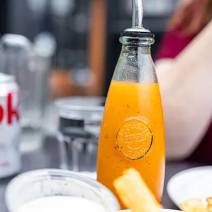 Housemade Orange Hot Sauce (you may have to ask for it)