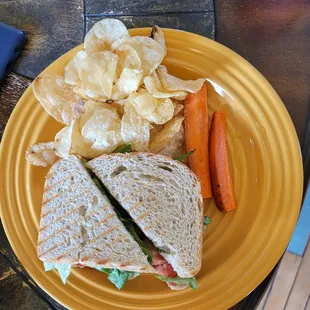 BLT with kettle chips and carrots.