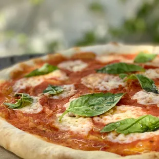 The Margherita. Carnitas, Red Onions, Sliced Jalapenos, Fresh Cilantro, Tequila Cream Sauce &amp; Mozzarella