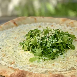 The Cheese Queen. Parmesan, Fontina, Ricotta, Fresh Mozzarella, &amp; Organic Arugula.