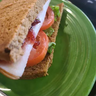 Turkey Cranberry half sandwich with Caesar salad