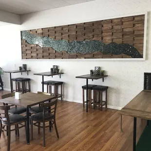 Beautiful mural and high top tables