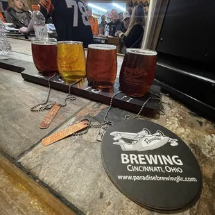  row of beer glasses on a bar