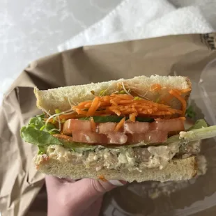 Shrimp salad on sourdough (mainly just the toppings and very little shrimp salad)