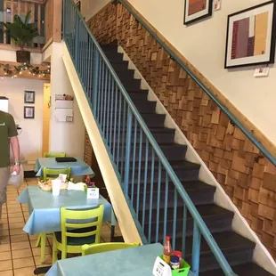 a man walking down the stairs