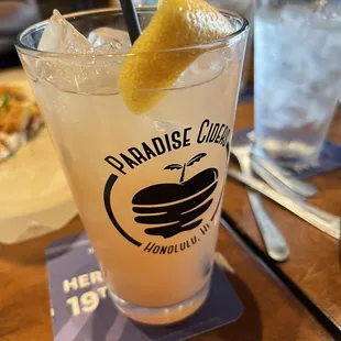 a drink with a slice of lemon