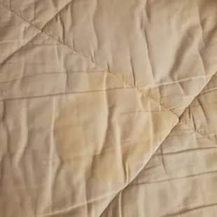 a closeup of a quilted bed