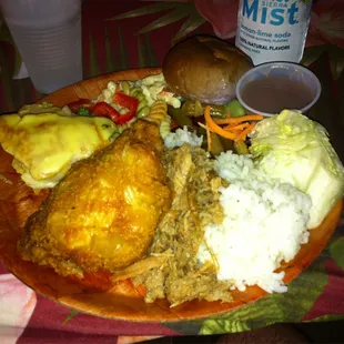 Fish, fried chicken, pulled pork, salad, poi, taro roll, pasta salad
