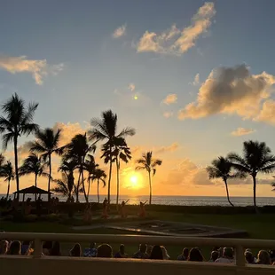 the sun setting over the ocean