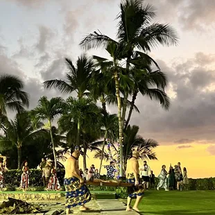 a group of people playing a game of frisbee