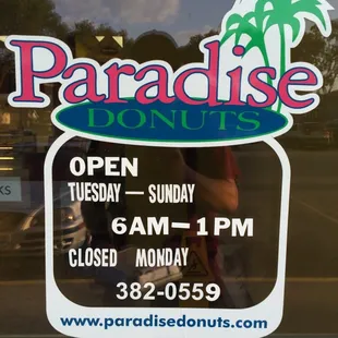 a sign in the window of a restaurant