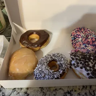 a variety of donuts in a box