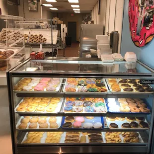So many tasty options, I wanted to buy them all! Round donuts with a hole are $10.50 a dozen or mixed donuts for $14.00 a dozen.