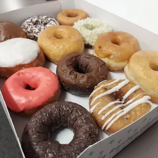 a variety of donuts in a box