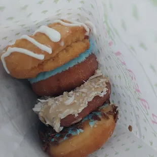 three doughnuts in a wrapper