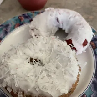 Paradise Donuts (at home) blueberry coconut, frosted red velvet with light coconut.