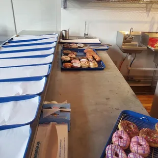 donuts lined up on a counter
