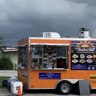 a food truck parked in a parking lot