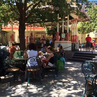 a group of people sitting at tables