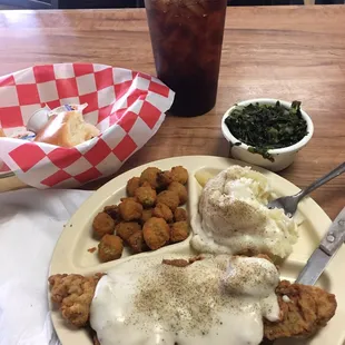 Steam table selection of Chicken fried steak, vegetables and desert!