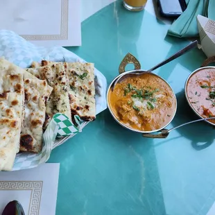 Our usual spread...garlic Naan, plain Naan, coconut lamb curry and chicken Tikka masala
