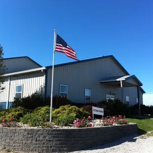 a flag in front of a building