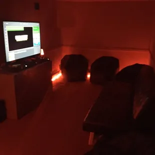 a living room with a flat screen tv