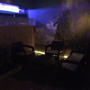 lounge chairs in a dimly lit room