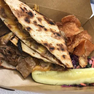 BBQ Brisket Melt with pickle, chips and coleslaw