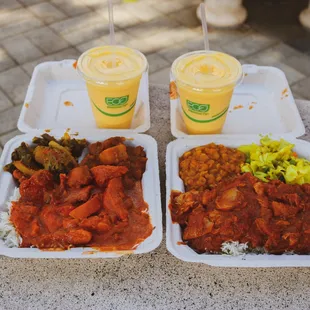two trays of food with drinks