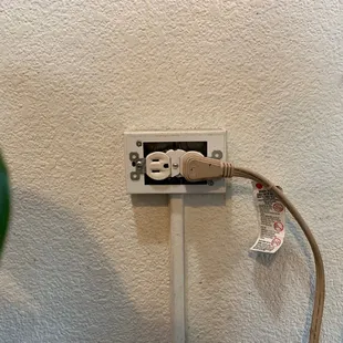 Exposed outlet in the kids play area.