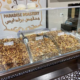 a display of nuts in a glass case