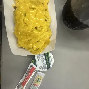 This is supposed to be "loaded" nachos with ground beef.... Where's the meat?