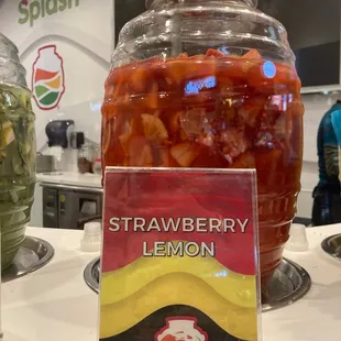 a jar of strawberries and lemon