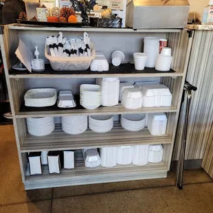 Clean dishes and utensils adorned by decorative and festive tems