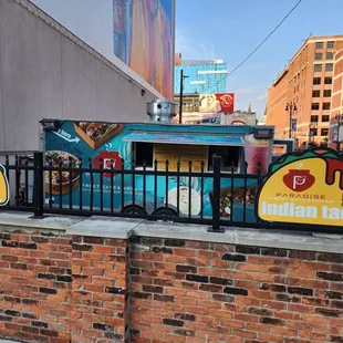 a food truck parked on the side of the road