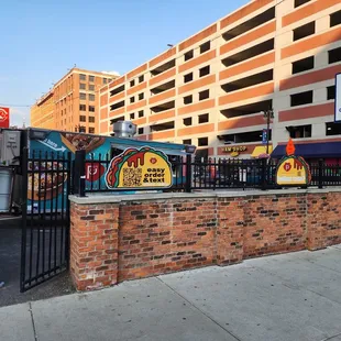 a brick wall with graffiti on it