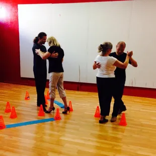 Beginning Tango Class - Working on Floorcraft. As a lead you need to be able to navigate around a dance floor.