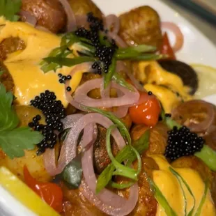 Potato tostones with caviar