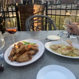 Wings and jumbo shrimp and glasses of sangria!