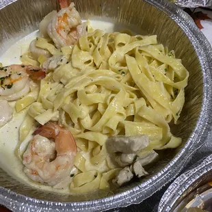 Fettuccine Alfredo with shrimp, scallops and chicken.