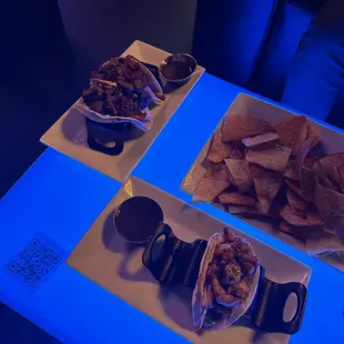 three plates of food on a table