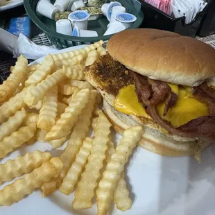 So called breaded chicken breast added cheese &amp; bacon $5