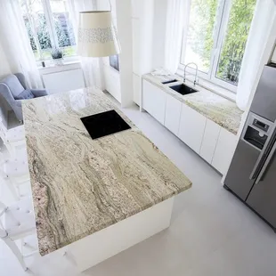 a kitchen with a granite countertop